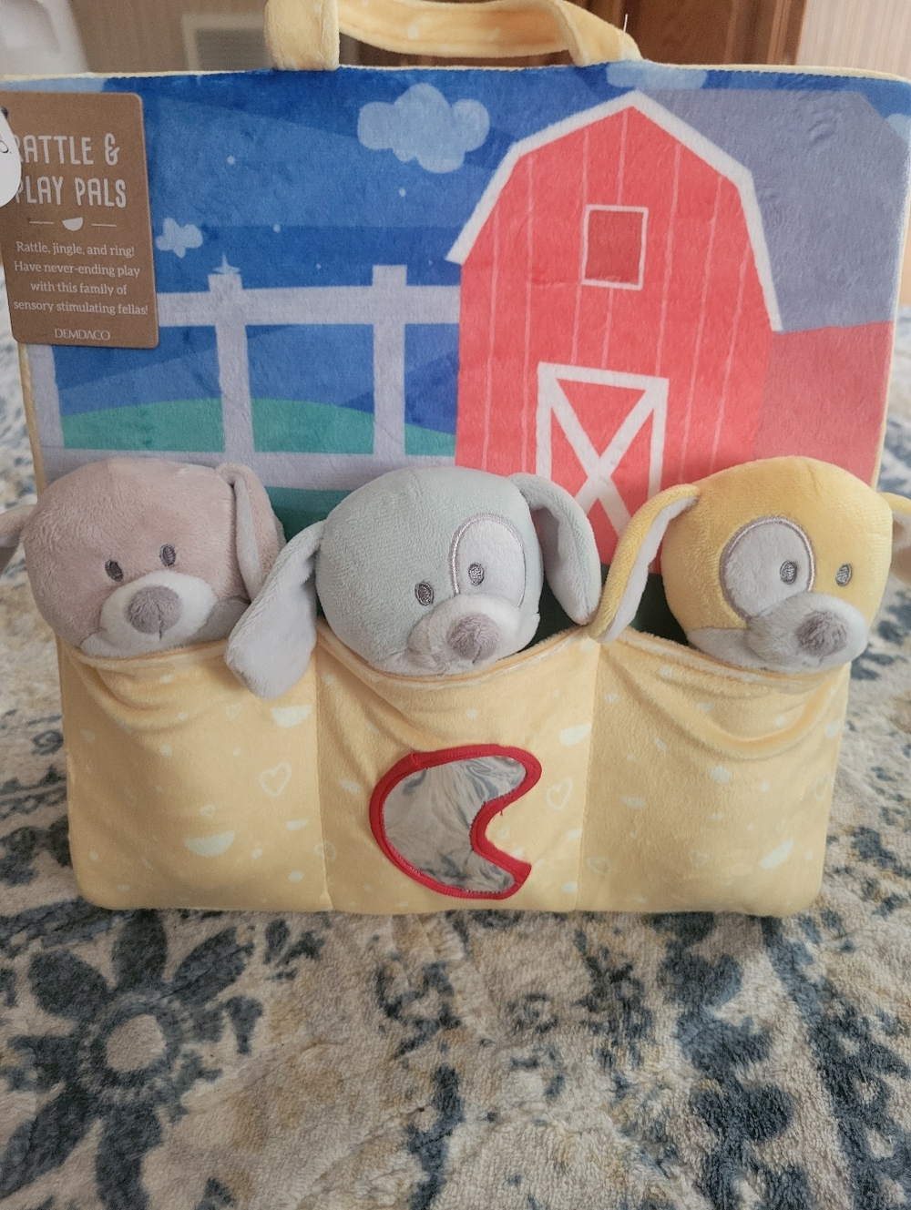 NWT Blue and Yellow Rattle & Play Pals Soft Puppies.